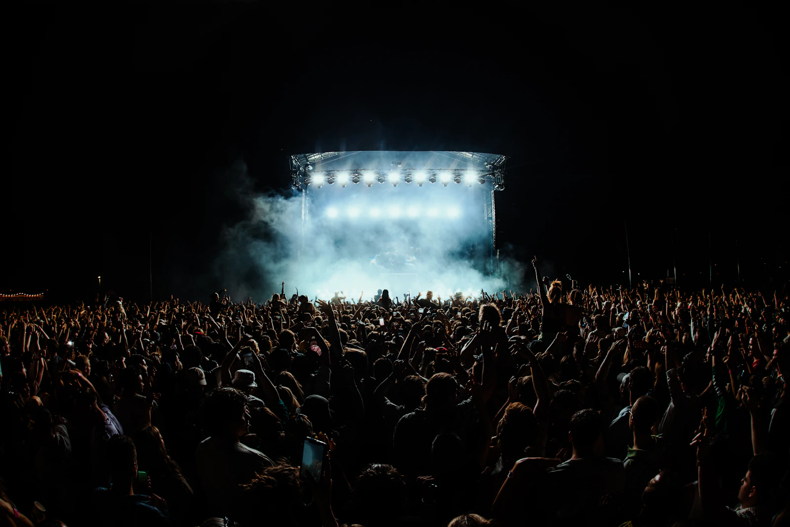 Concert crowd gathered in front of the stage during a live show