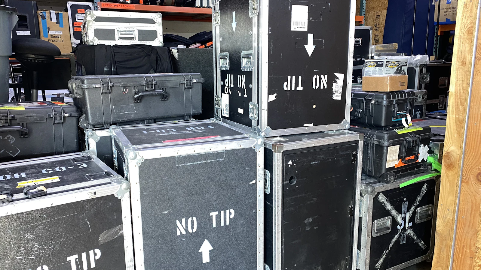 Road cases and equipment packed backstage during concert load-out