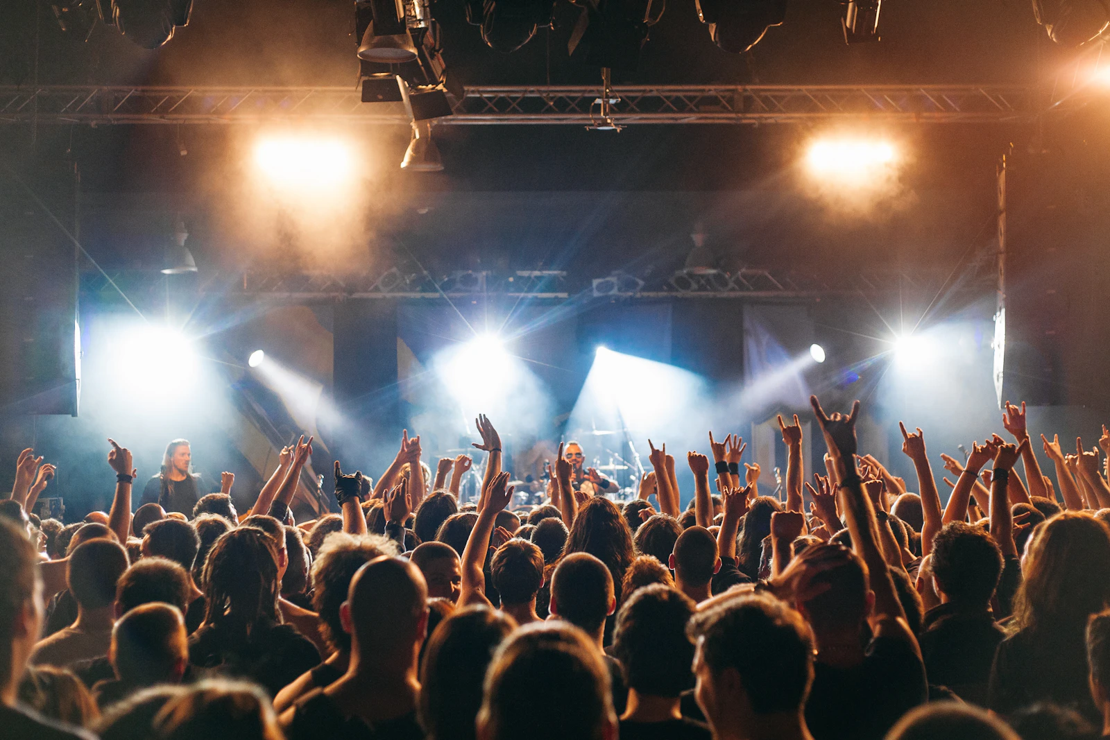 Live concert production with stage lights and audience in Dubai