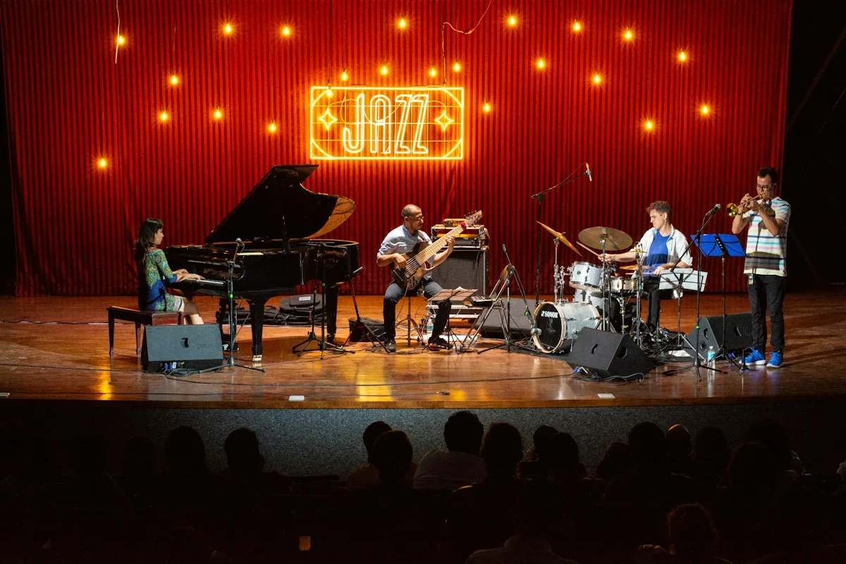 Live music band for events with pianist and musicians performing on stage
