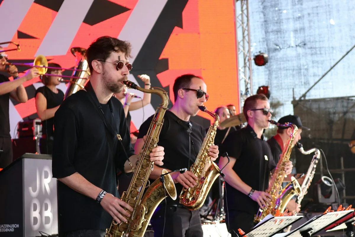 Saxophonists for events performing a live saxophone show on stage