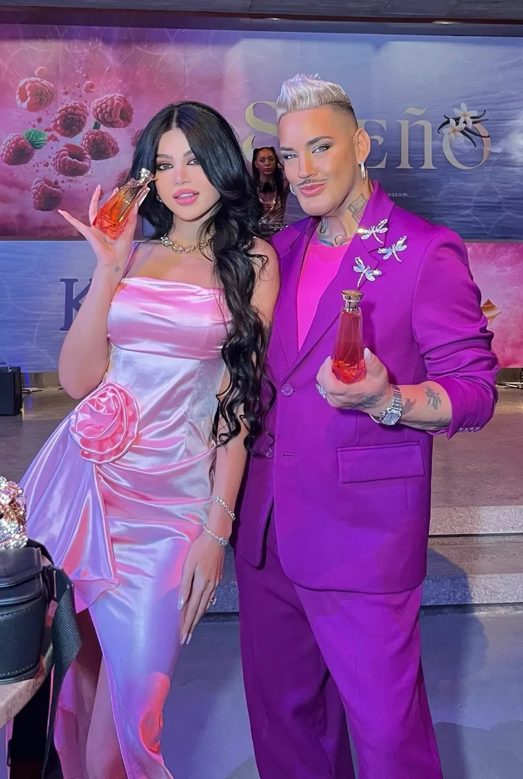 Guests holding a new perfume at a private fragrance launch at Someone’s House in Dubai