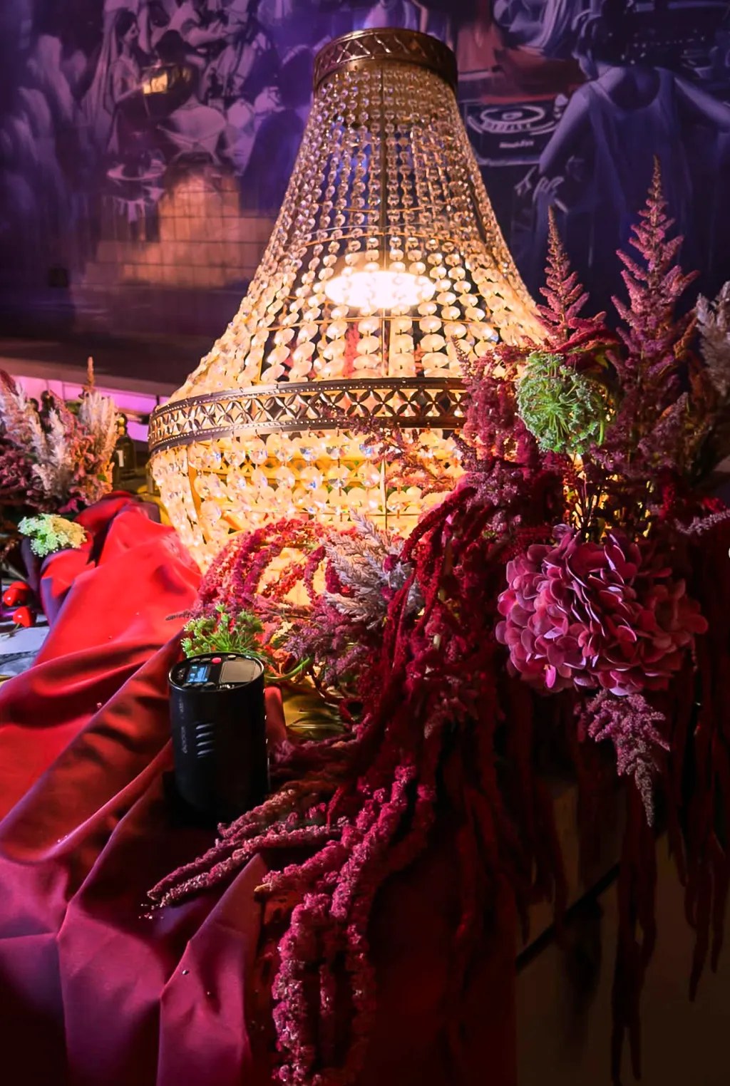 Crystal chandelier and floral decoration at Someone’s House