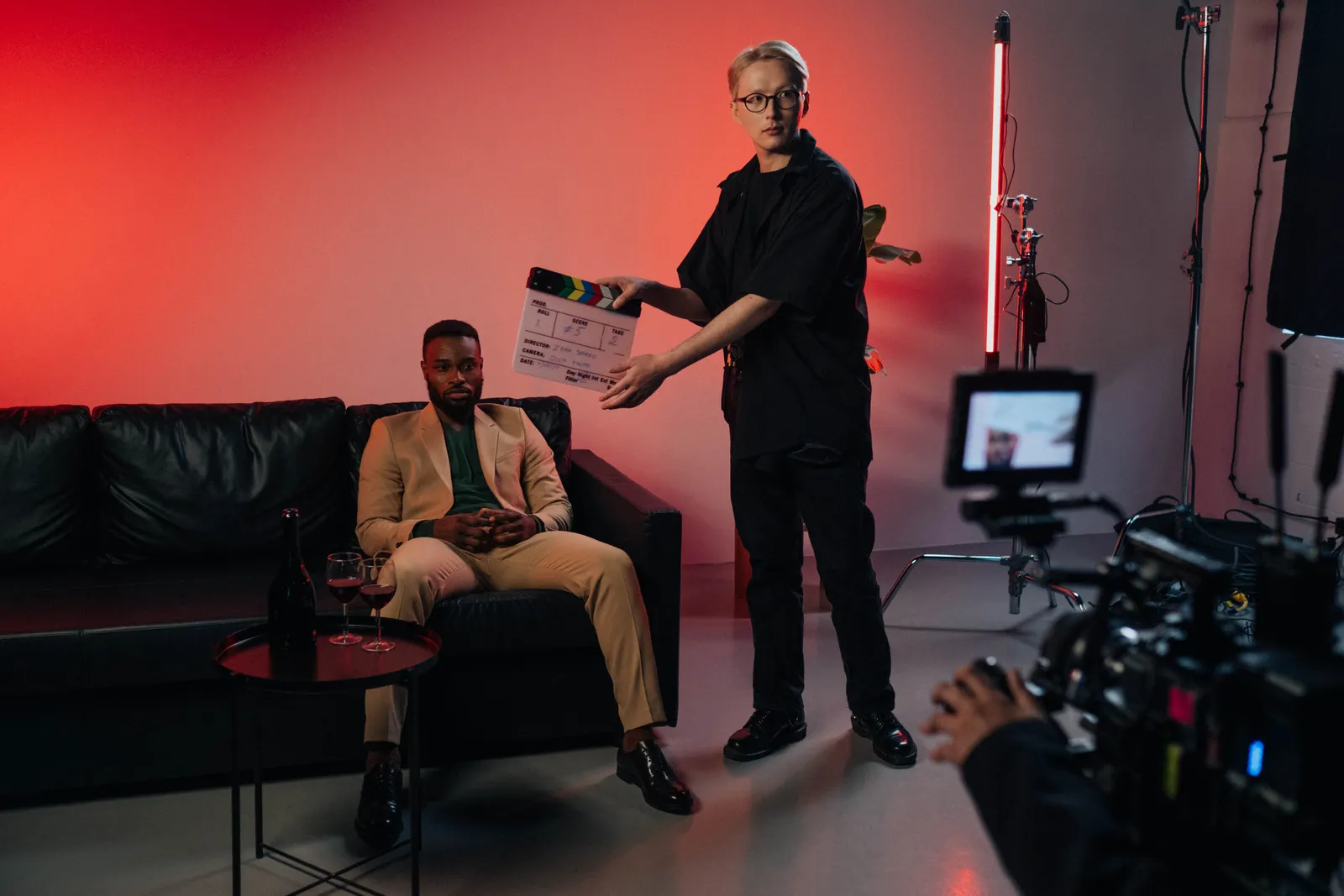 Executive seated on a studio set during an interview video shoot